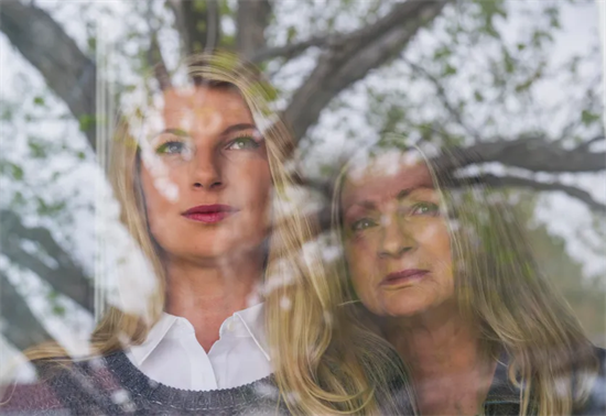 Then-state Rep. Brittany Pettersen, left, and her mother Stacy pose for a picture at their Lakewood home