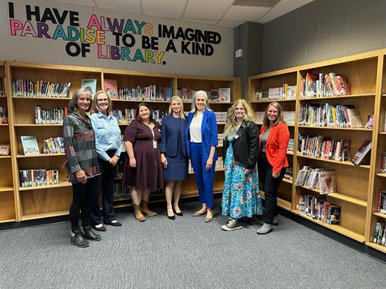 Rep. Pettersen stands with Whip Clark at a child care roundtable